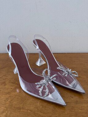 Amina Muaddi Rosie Glass Sling Pumps in transparent PVC with crystal bow embelli
